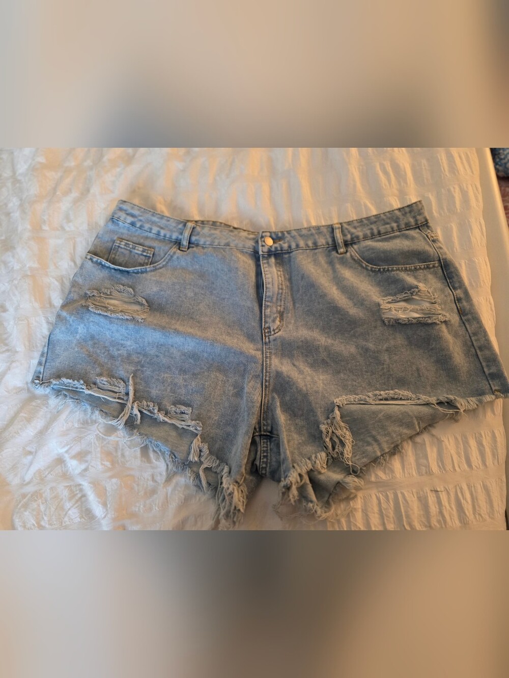 Distressed Light Blue Denim Shorts